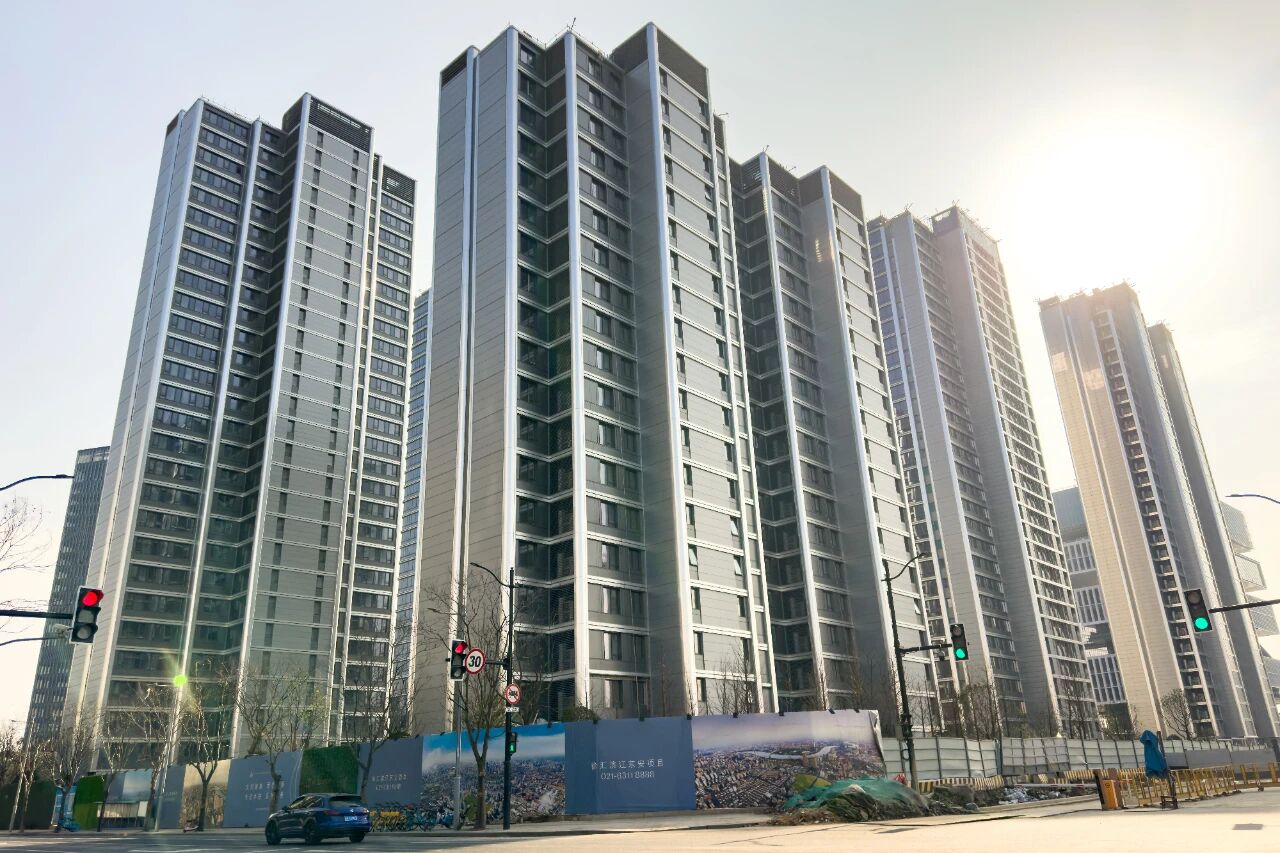 Shanghai eases property curbs further to boost market